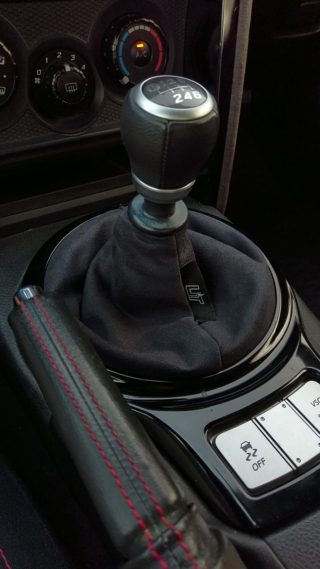 My shift knob cover (black thing with writing over the actual